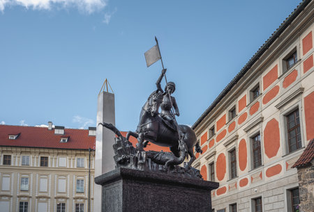 Prague, Czechia - Sep 30, 2019: Statue of Saint George at Prague Castle 3rd Courtyard with St Vitus Cathedral - Prague, Czech Republicのeditorial素材