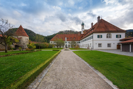 Bavaria, Germany - Nov 06, 2019: Franciscan Monastery Garden with old City wall and defense tower - Fussen, Germanyのeditorial素材