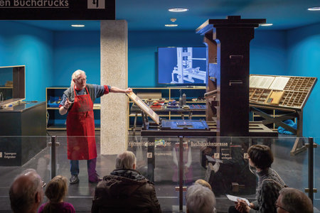 Mainz, Germany - Jan 22, 2020: Gutenberg Press Demonstration at Gutenberg Museum Interior - Mainz,...