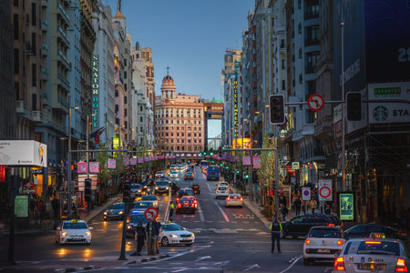 Madrid, Spain - Mar 22, 2019: Gran Via Street traffic at early evening - Madrid, Spainのeditorial素材