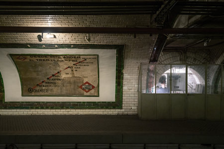 Madrid, Spain - Jun 20, 2019: Platform of former Chamberi Station of Madrid Metro with old Subway Stations Map - Madrid, Spainのeditorial素材
