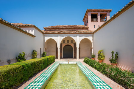 Malaga, Spain - May 18, 2019: Patio de la Alberca (Pool Courtyard) in Nasrid and Taifa Palace at Alcazaba Fortress - Malaga, Andalusia, Spainのeditorial素材