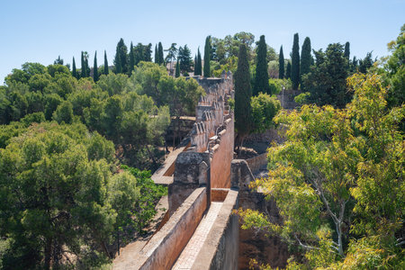 Malaga, Spain - May 18, 2019: Coracha - Wall Connecting Alcazaba Fortress and Gibralfaro Castle - Malaga, Andalusia, Spainのeditorial素材