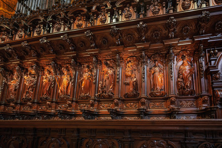 Malaga, Spain - May 19, 2019: Wooden Choir stalls of Malaga Cathedral - Malaga, Andalusia, Spainのeditorial素材