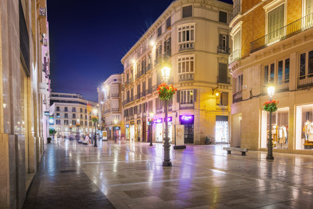 Malaga, Spain - May 19, 2019: Calle Larios at night - famous pedestrian and shopping street - Malaga, Andalusia, Spainのeditorial素材