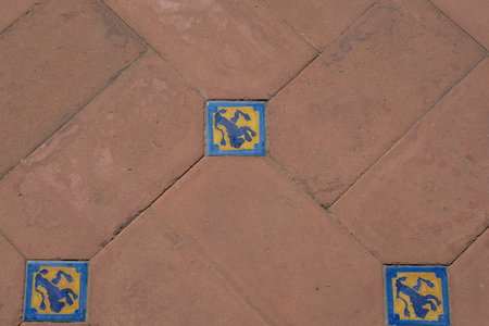 Seville, Spain - Apr 5, 2019: Tiles with Leon Coat of Arms at Plaza de Espana - Seville, Andalusia, Spainのeditorial素材