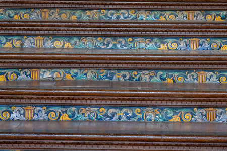 Seville, Spain - Apr 5, 2019: Staircase decoration of Puerta de Aragon Pavilion (Aragon Door) at Plaza de Espana - Seville, Andalusia, Spainのeditorial素材