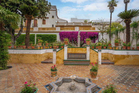 Seville, Spain - Apr 7, 2019: Small Garden (Jardin Chico) at Casa de Pilatos (Pilates House) Palace Interior - Seville, Andalusia, Spainのeditorial素材