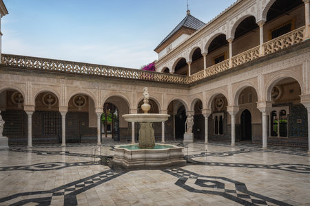 Seville, Spain - Apr 7, 2019: Main Courtyard (Patio Principal) at Casa de Pilatos (Pilates House) Palace Interior - Seville, Andalusia, Spainのeditorial素材