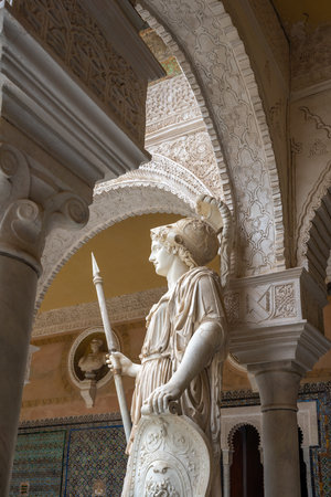 Seville, Spain - Apr 7, 2019: Pallas Athena Sculpture at Main Courtyard (Patio Principal) of Casa de Pilatos (Pilates House) Palace - Seville, Andalusia, Spainのeditorial素材