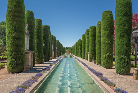 Cordoba, Spain - Jun 11, 2019: Paseo de los Reyes (Promenade of Kings) at Alcazar de los Reyes Cristianos Gardens - Cordoba, Andalusia, Spainのeditorial素材