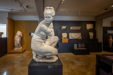 Cordoba, Spain - Jun 12, 2019: Crouching Aphrodite Sculpture at Archaeological Museum of Cordoba - Cordoba, Andalusia, Spainのeditorial素材