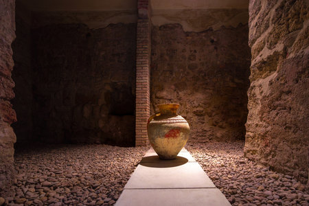 Cordoba, Spain - Jun 11, 2019: Jar at Service Area from Almohad period at Caliphal Baths (Banos del Alcazar Califal) - Cordoba, Andalusia, Spainのeditorial素材