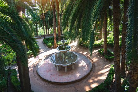 English Garden and Felipe II Fountain at Carmen de los Martires - Granada, Andalusia, Spainの写真素材