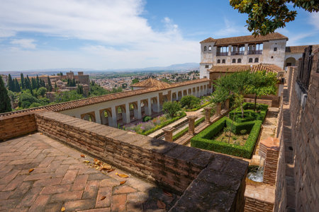 Granada, Spain - Jun 5, 2019: Generalife Palace view with both Courtyards and Alhambra on background - Granada, Andalusia, Spainのeditorial素材
