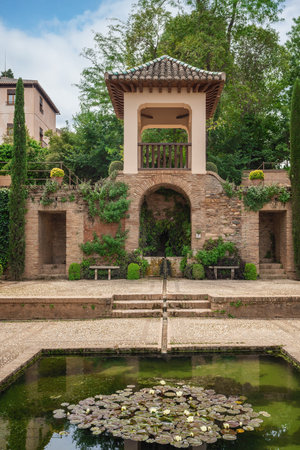 Granada, Spain - May 24, 2019: Gardens of El Partal at Alhambra - Granada, Andalusia, Spain