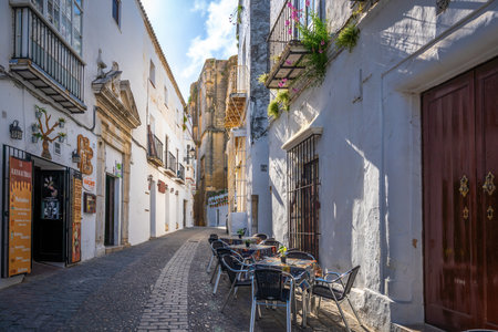 Arcos de la Frontera, Spain - Apr 10, 2019: Streets with restaurants - Arcos de la Frontera, Cadiz, Spainのeditorial素材