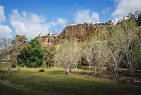 Arcos de la Frontera cliffs with Basilica of Santa Maria and San Pedro Church - Arcos de la Frontera, Cadiz, Spainの写真素材