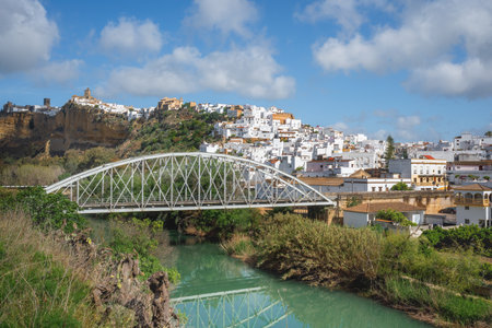 Arcos de la Frontera view with Guadalete River and San Miguel Bridge - Arcos de la Frontera, Cadiz, Spainの写真素材
