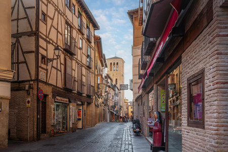 Toledo, Spain - Mar 26, 2019: Street and Church of Santo Tome - Toledo, Spainのeditorial素材