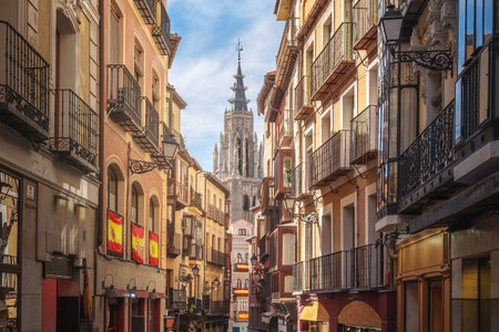 Street and Toledo Cathedral Tower - Toledo, Spainの写真素材