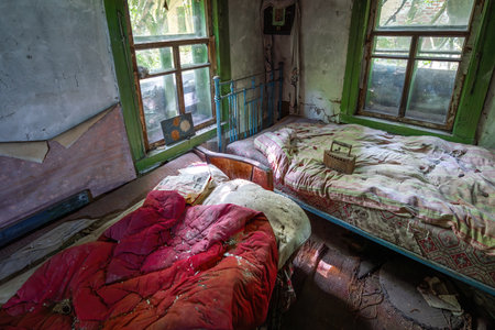 Chernobyl, Ukraine - Aug 06, 2019: Abandoned House Interior with objects - Zalissya Village, Chernobyl Exclusion Zone, Ukraineのeditorial素材