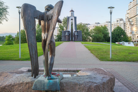 Minsk, Belarus - Aug 02, 2019: Crying Angel Sculpture and Sons of the Fatherland Monument at Island of Tears - Minsk, Belarusのeditorial素材