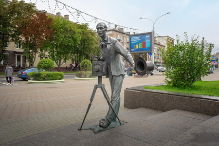 Minsk, Belarus - Aug 01, 2019: Photographer Sculpture by Vladimir Zhbanov at Komarovsky Market Square - Minsk, Belarusのeditorial素材