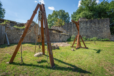 Cesis, Latvia - Jul 21, 2019: Stone-lifting devices at Cesis Castle Medieval Activity Area - Cesis, Latviaのeditorial素材