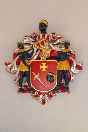 Riga, Latvia - Jul 13, 2019: Coat of arms of the Brotherhood of Blackheads at House of the Black Heads Interior - Riga, Latviaのeditorial素材