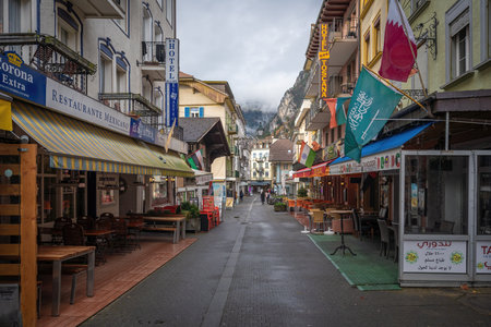 Interlaken, Switzerland - Nov 28, 2019: Jungfraustrasse Street with Restaurants - Interlaken, Switzerlandのeditorial素材