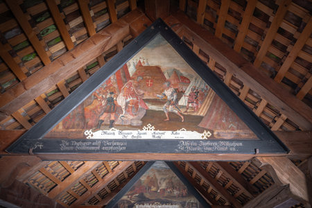 Lucerne, Switzerland - Nov 27, 2019: Maurice receives Secundus - Painting depicting events from Lucerne history at Chapel Bridge (Kapellbrucke) - Lucerne, Switzerlandのeditorial素材