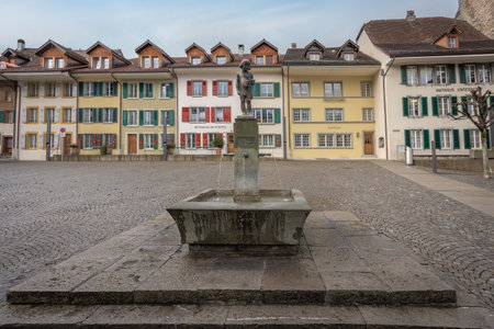 Unterseen, Switzerland - Nov 28, 2019: Marktbrunnen (Market Fountain) at Unterseen Square - Interlaken, Switzerlandのeditorial素材