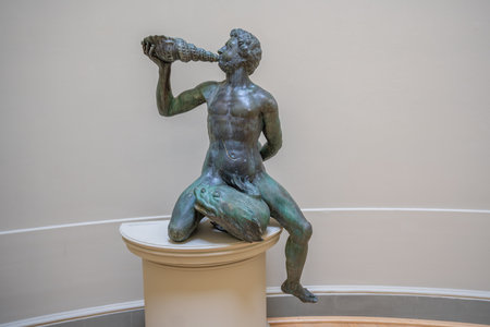 Innsbruck, Austria - Nov 15, 2019: Triton - Original Statue from Leopold Fountain at Ferdinandeum - Tyrolean State Museum - Innsbruck, Austriaのeditorial素材
