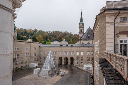 Domplatz with Franciscan Church Tower - Salzburg, Austriaの写真素材