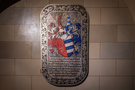 Baden-Wurttemberg, Germany - Dec 14, 2019: Memorial Plaque with Coat of Arms at St. Michael Chapel - Catholic Chapel at Hohenzollern Castle - Germanyのeditorial素材