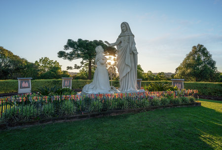 Farroupilha, Brazil - Oct 14, 2023: Mysteries of the Rosary and Virgin Mary Statue at Our Lady of Caravaggio Sanctuary - Farroupilha, Rio Grande do Sul, Brazilの写真素材