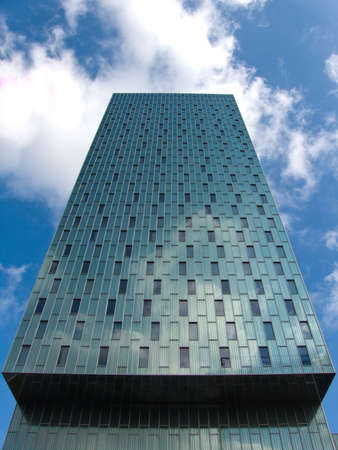 Modern building with blue sky and glass wallsの写真素材