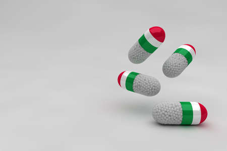 Italian pills close up. Medicine for the coronavirus that affects Italy. Medicinal capsules with the flag of Italy and white pillsの写真素材