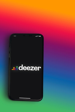 Deezer online music app on smartphone screen on colorful background. Top view. Rio de Janeiro, RJ,...