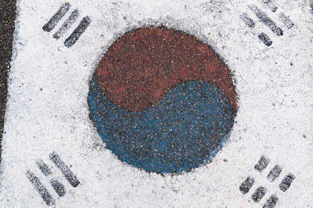 Korean flag painted on the asphalt in the country's colors. Alphast texture and paint colors.の写真素材
