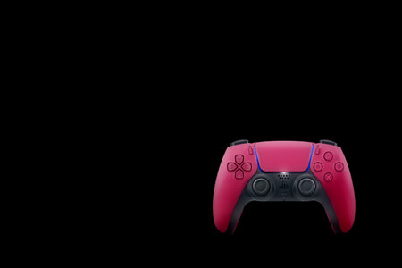 Playstation 5 Dual Sense Cosmic Red controller isolated on black background. Top view. Rio de...