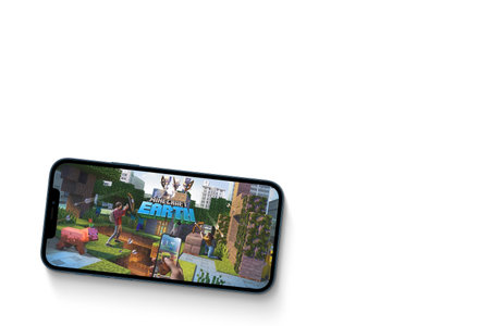 Minecraft Earth game app on the smartphone screen on white background. Top view. Rio de Janeiro, RJ, Brazil. July 2021.のeditorial素材