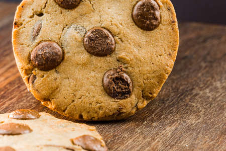 Chocolate cookies on wooden table. Close-up. selective focusの写真素材