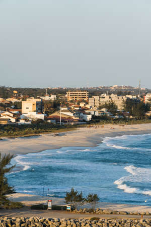 Sunset at ItaÃºna Beach, Saquarema in Rio de Janeiro, Brazil. Famous for waves and surfing.の写真素材
