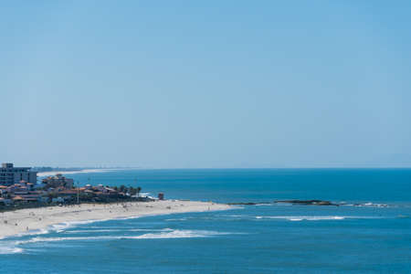 Sunny Day at ItaÃºna Beach, Saquarema in Rio de Janeiro, Brazil. Famous for waves and surfing.の写真素材