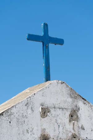 Cross of the Church of Nossa Senhora da NazarÃ© located in Saquarema, Rio de Janeiro. Sunny day with blue sky in the background.の写真素材