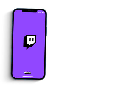 Twitch app on smartphone screen on white background. Rio de Janeiro, RJ, Brazil. August 2021.のeditorial素材