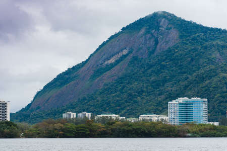 Jacarepagua Lagoon in Rio de Janeiro. Mountains and buildings in the background. Selective focus.の写真素材