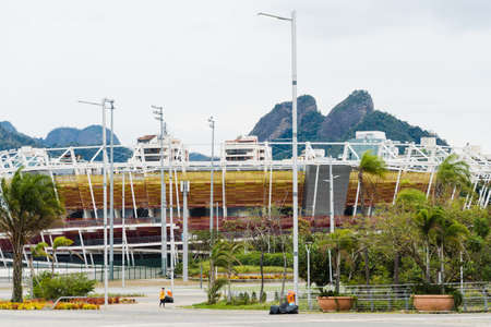 Sports gym in a park in Barra da Tijuca, Rio de Janeiro. Mountains and buildings in the background. Selective focus.の写真素材